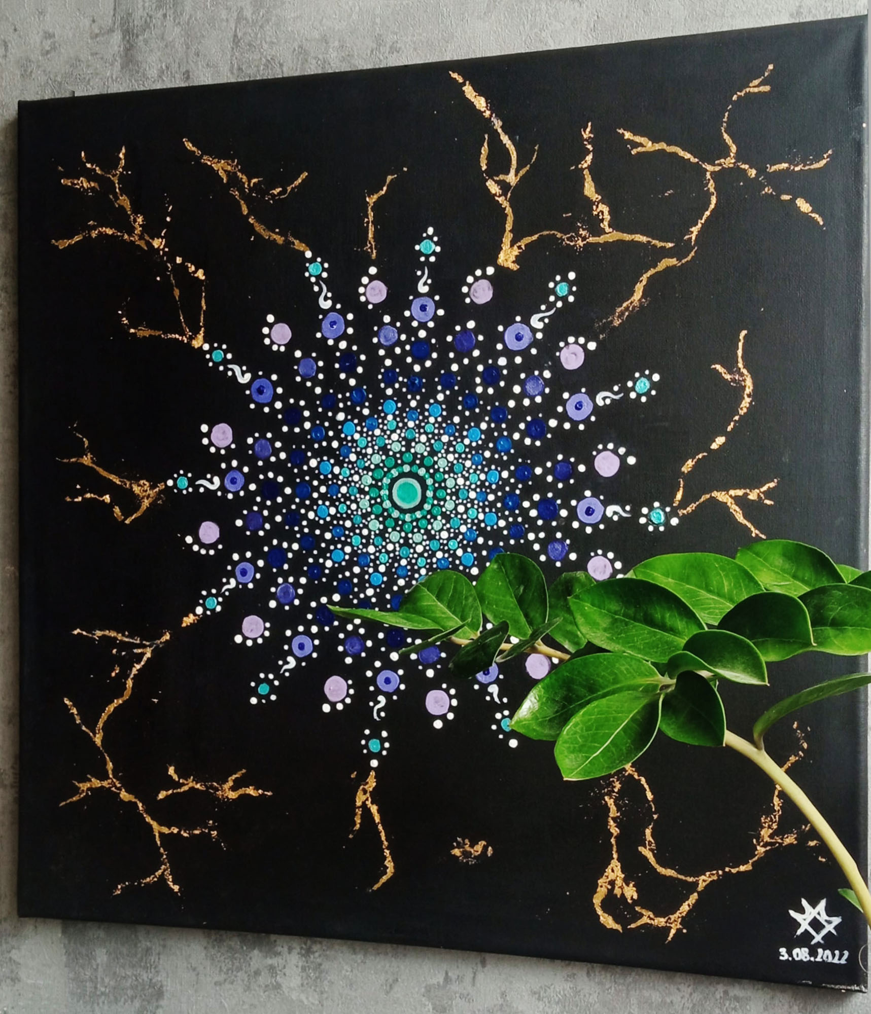 painting of a colorful mandala